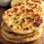 Homemade Cottage Cheese Flatbread topped with fresh herbs and ingredients.