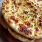 Healthy cottage cheese flatbread served with toppings.