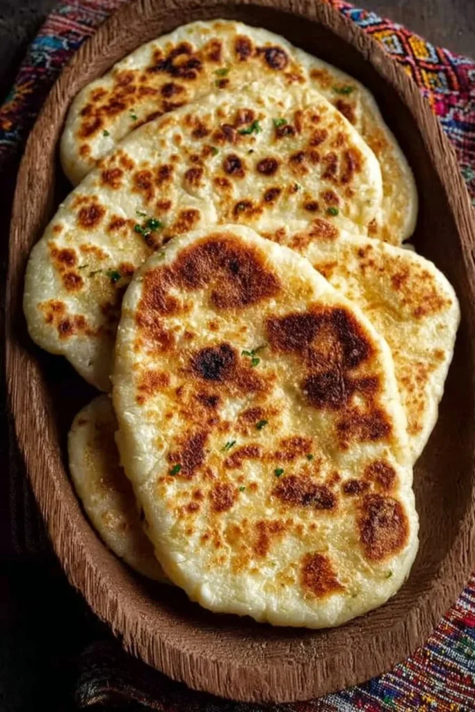 Freshly made cottage cheese flatbread served with toppings