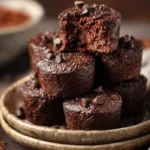 Flourless chocolate protein brownie bites on a plate, healthy dessert option