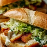 Delicious Chicken Caesar Sandwich with fresh greens and creamy dressing