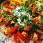 Delicious Chicken Fajita Rice Bowl with colorful vegetables and seasoned chicken