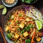 High Protein Tofu Pad Thai with colorful vegetables and noodles
