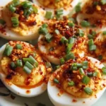 spicy chili garlic deviled eggs 2026 04 06 160733 683x1024 1